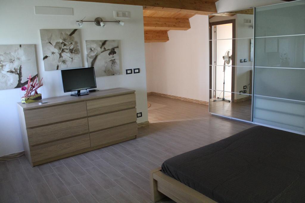 Appartamento Le Tre Palme Frigintini Zimmer foto